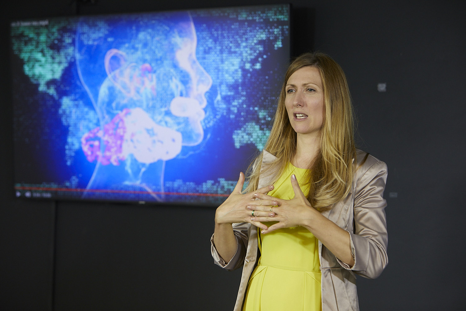 Audrey Muliva speaking on stage